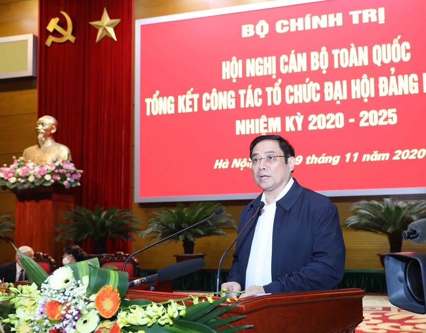 越共中央政治局委员、书记处书记、中央组织部部长范明政在会上致辞
