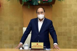 阮春福总理主持召开政府常委会与新冠肺炎防控国家指导委员会的会议