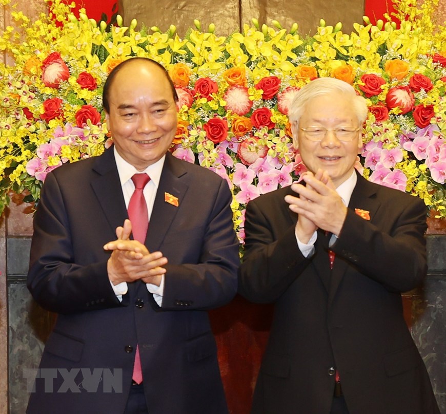 国家主席阮春福（左）与越共中央总书记、前国家主席阮富仲
