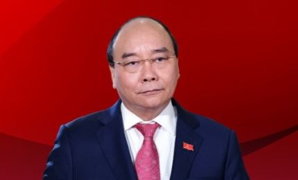 国家主席阮春福在胡志明市古芝和霍门县选举单位竞选越南国会代表