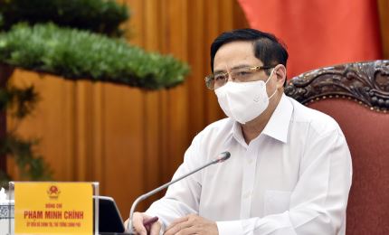 越南政府总理范明正就中期公共投资计划与各部委举行工作会议