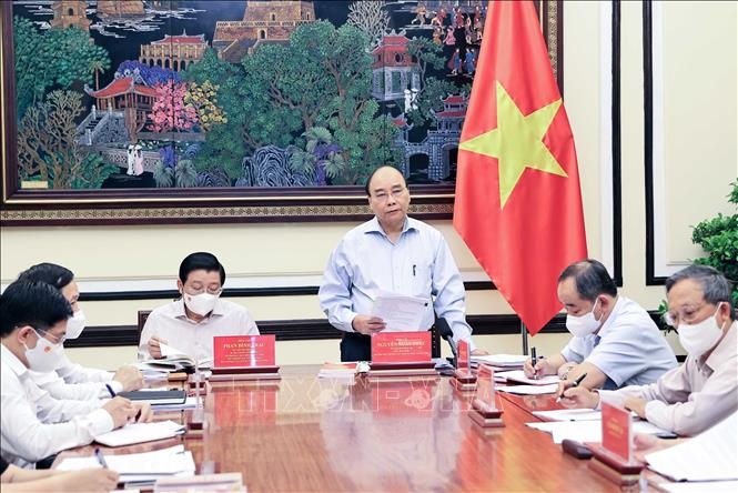 越南国家主席、中央司法改革指导委员会主任阮春福在会上致辞（图源：越通社）